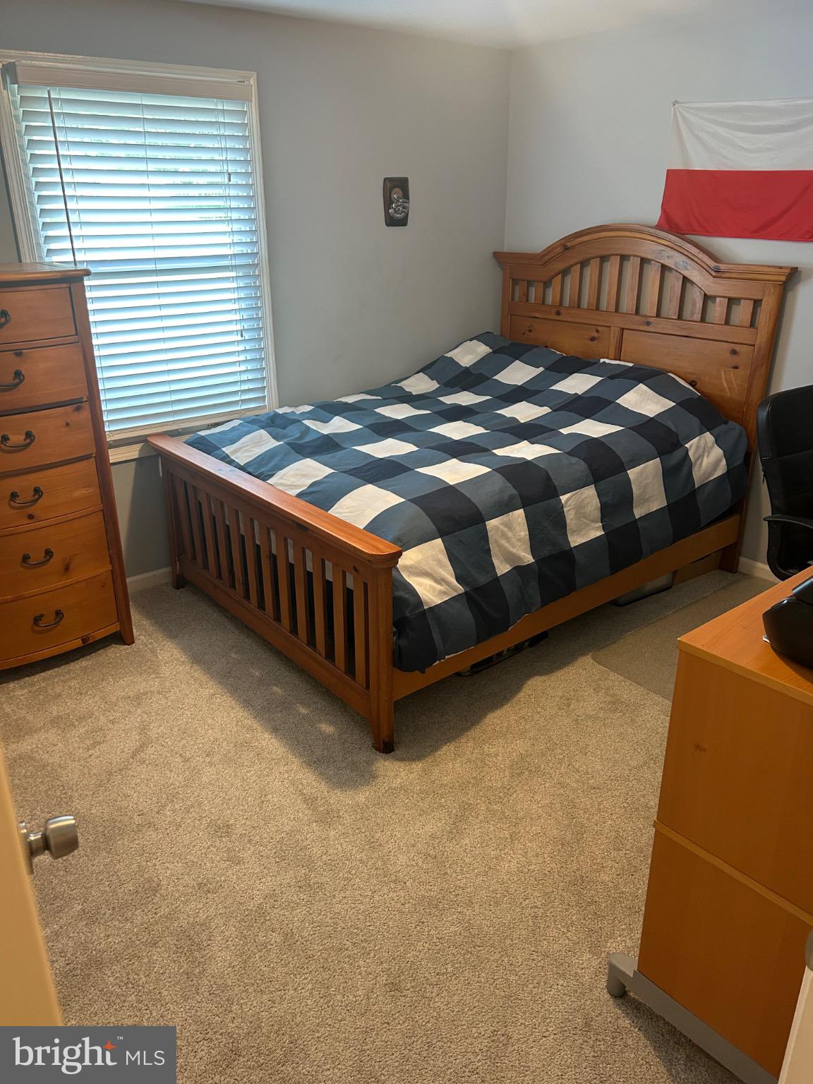 159 Planebrook Road Malvern, PA 19355 - Photo 23 of 30 a bedroom with a bed and a window