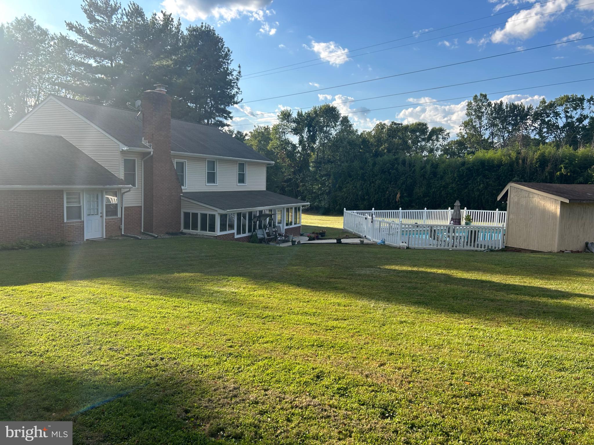 159 Planebrook Road Malvern, PA 19355 - Photo 6 of 30 a view of a swimming pool with a patio