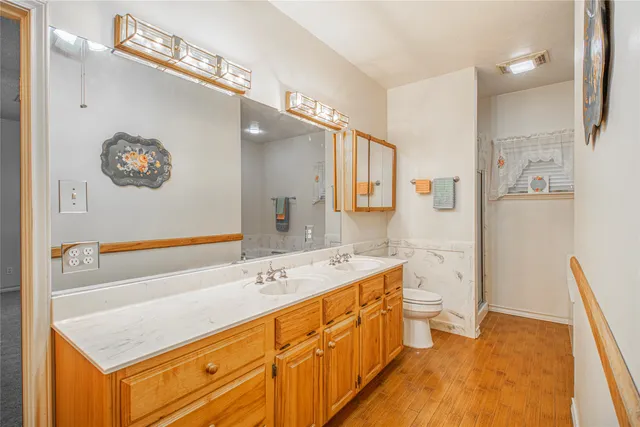 a bathroom with a sink a mirror and a bathtub