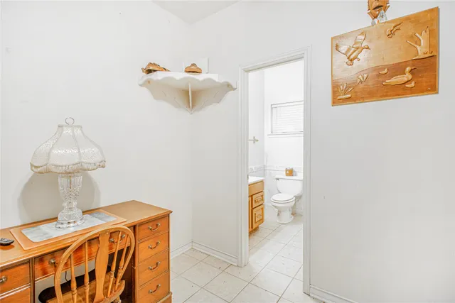 a view of a livingroom with furniture and windows