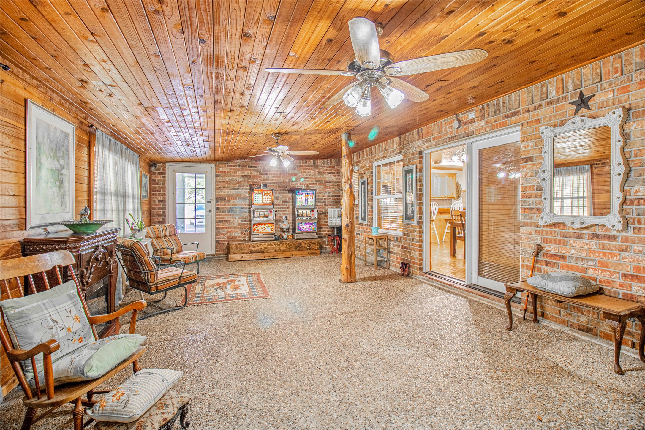 9310 South Business 6 Navasota, TX 77868 - Photo 40 of 48 a living room with furniture and a chandelier