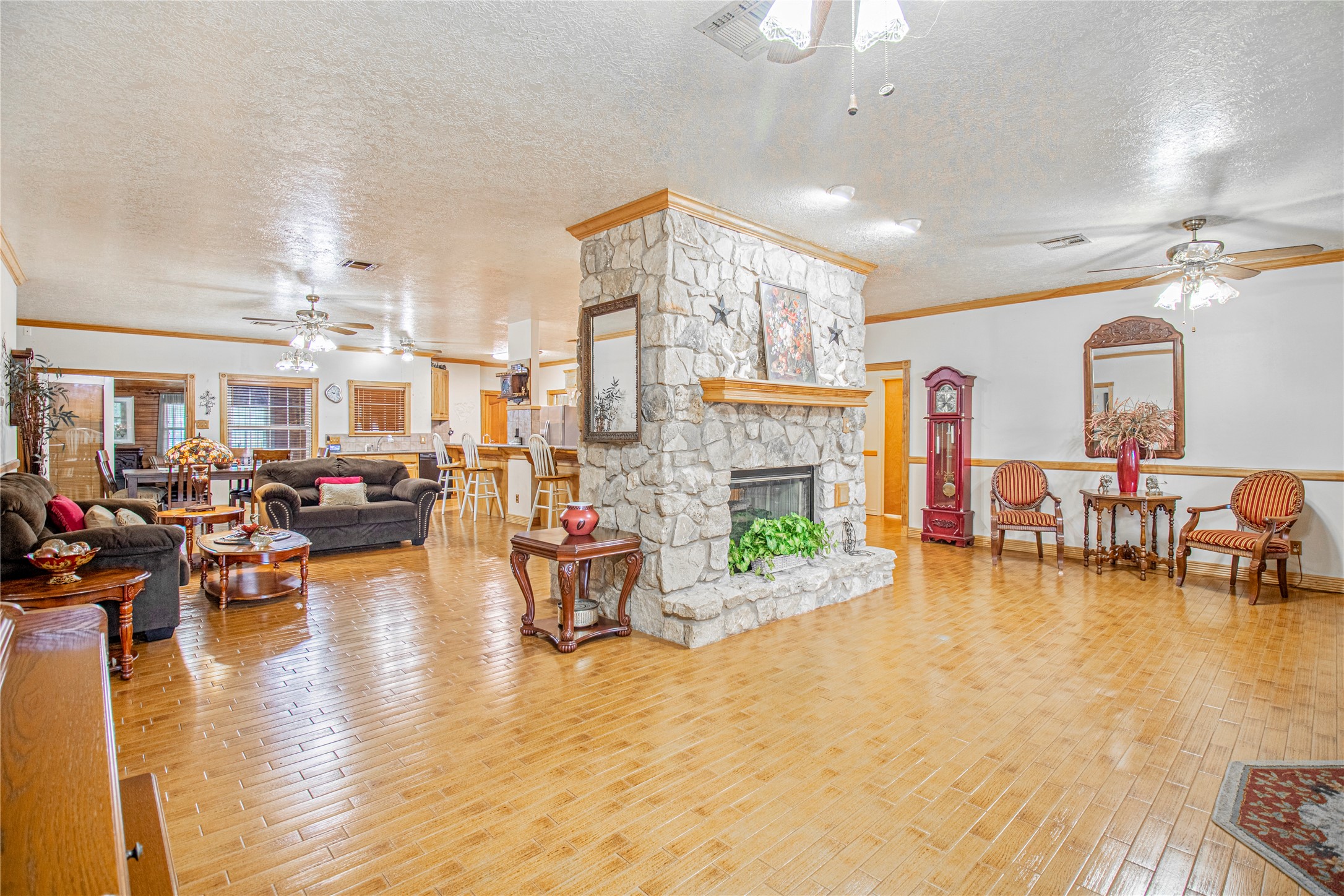 9310 South Business 6 Navasota, TX 77868 - Photo 8 of 48 a living room with fireplace furniture and a large window