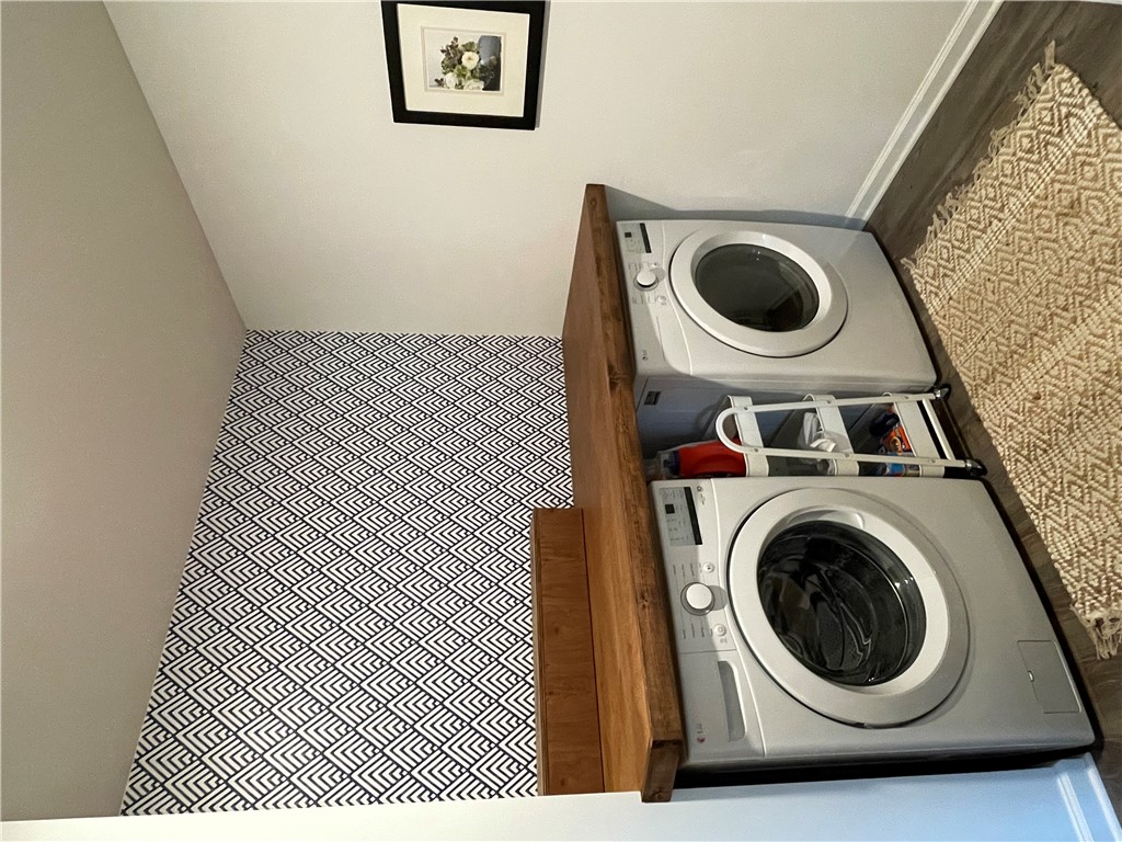 412 Chadwick Lane Walhalla, SC 29691 - Photo 10 of 28 A clever and compact laundry setup maximizes space with stacked appliances.