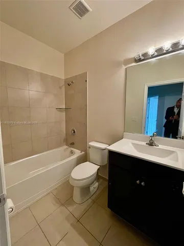 a view of a room with an empty space