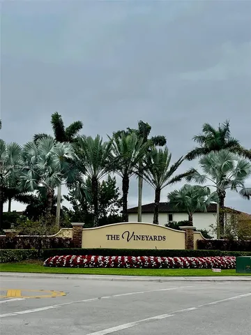 a view of a swimming pool and an outdoor space