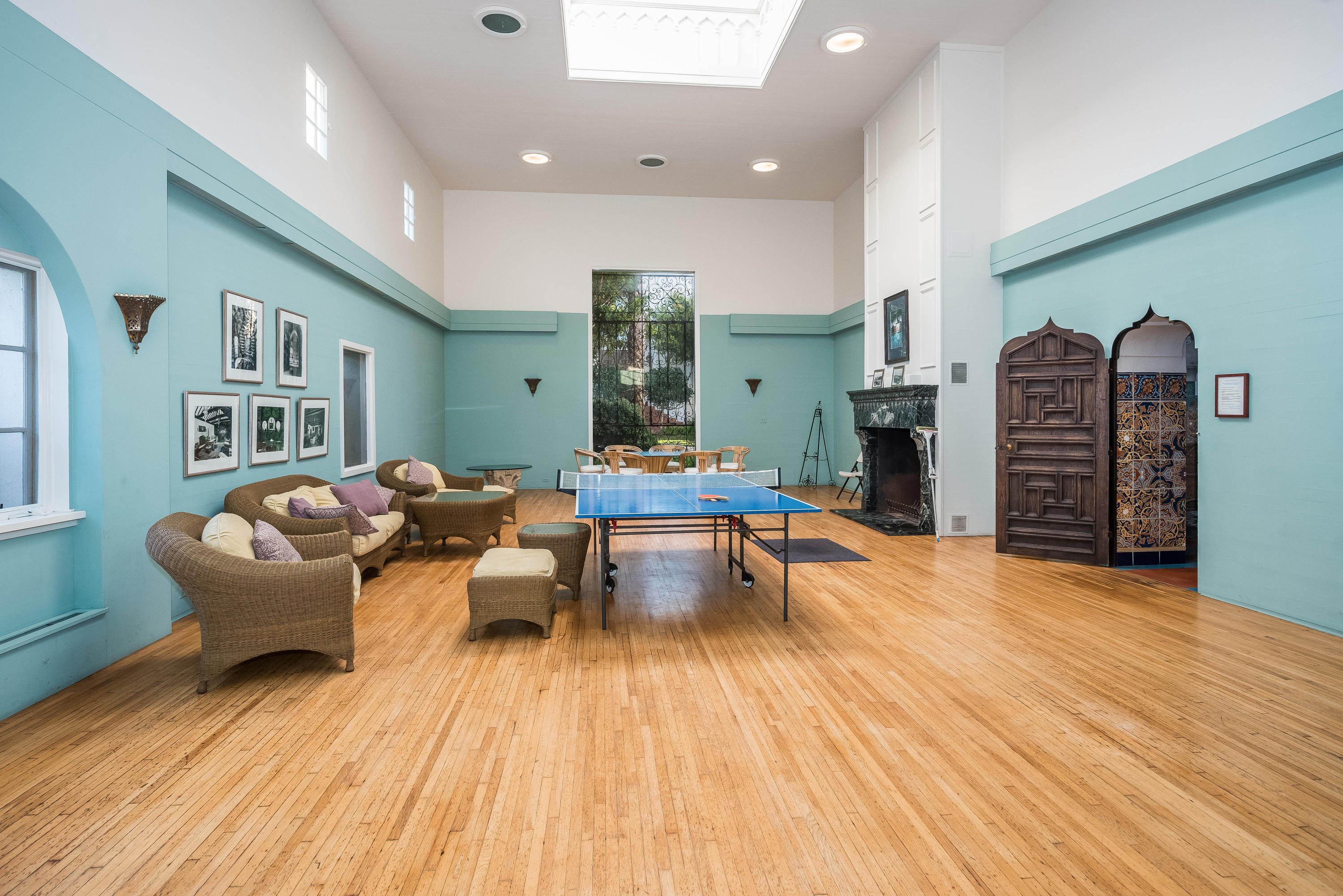 875 Sand Point Road Carpinteria, CA 93013 - Photo 23 of 25 a living room with furniture and wooden floor