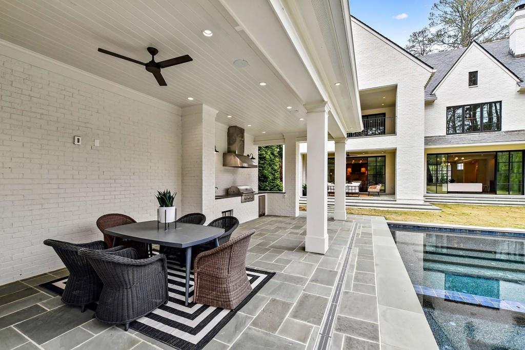 258 Pineland Road Northwest Atlanta, GA 30342 - Photo 32 of 87 a living room with furniture and a rug