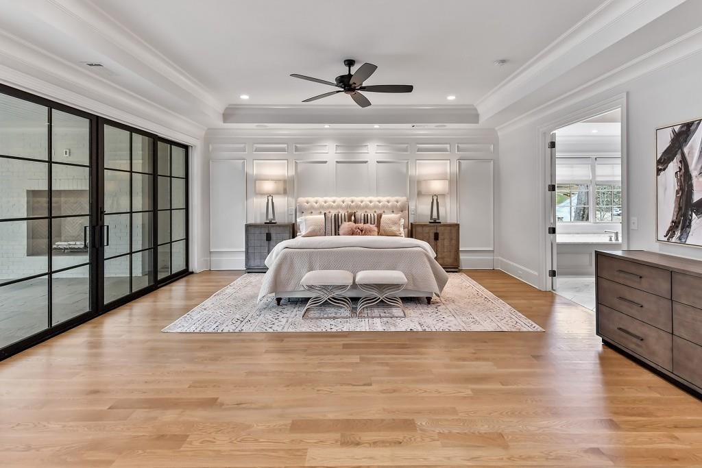 258 Pineland Road Northwest Atlanta, GA 30342 - Photo 47 of 87 a large bed sitting in a room next to a window