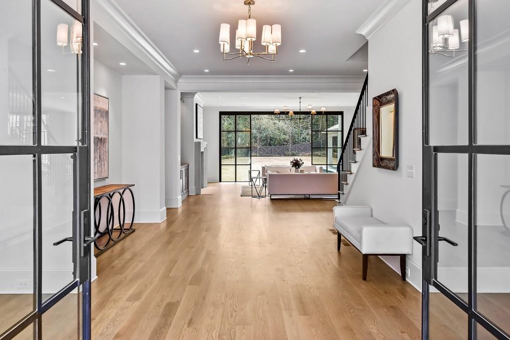 258 Pineland Road Northwest Atlanta, GA 30342 - Photo 5 of 87 a living room with furniture and a large window