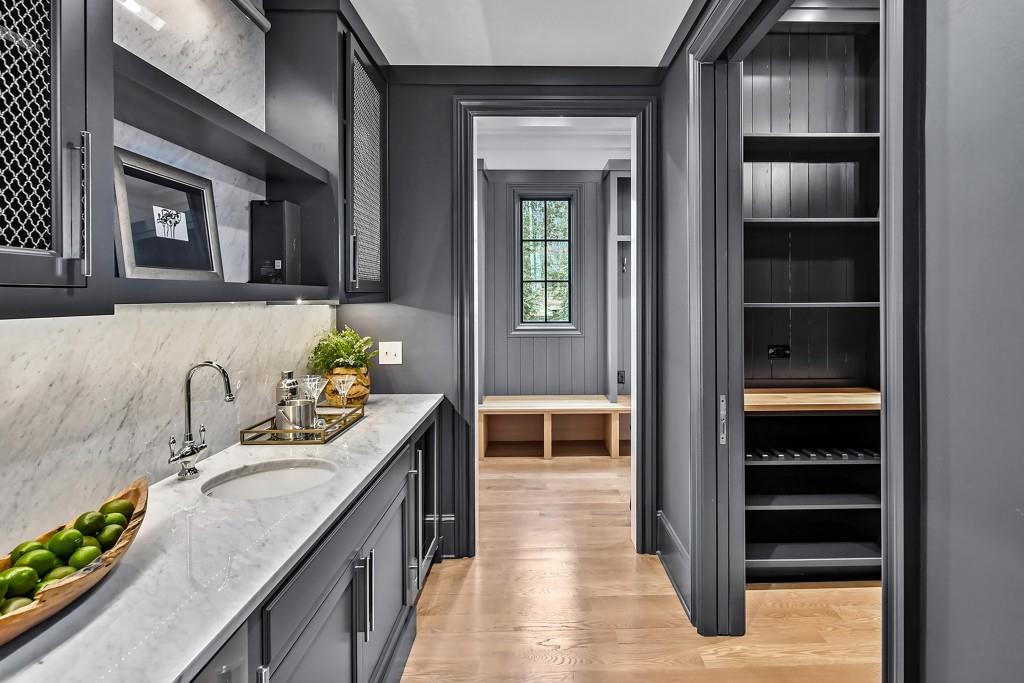 258 Pineland Road Northwest Atlanta, GA 30342 - Photo 10 of 87 a kitchen with a refrigerator and stove