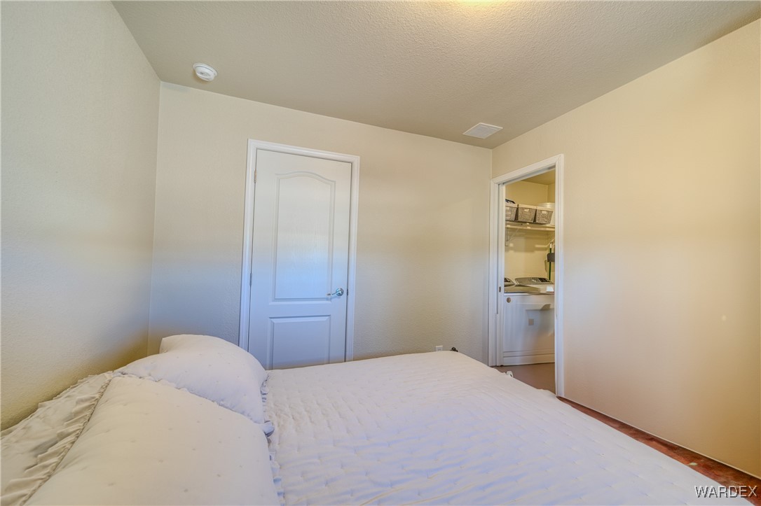 10747 South Paradise Trails Road Yucca, AZ 86438 - Photo 15 of 34 Master Bedroom