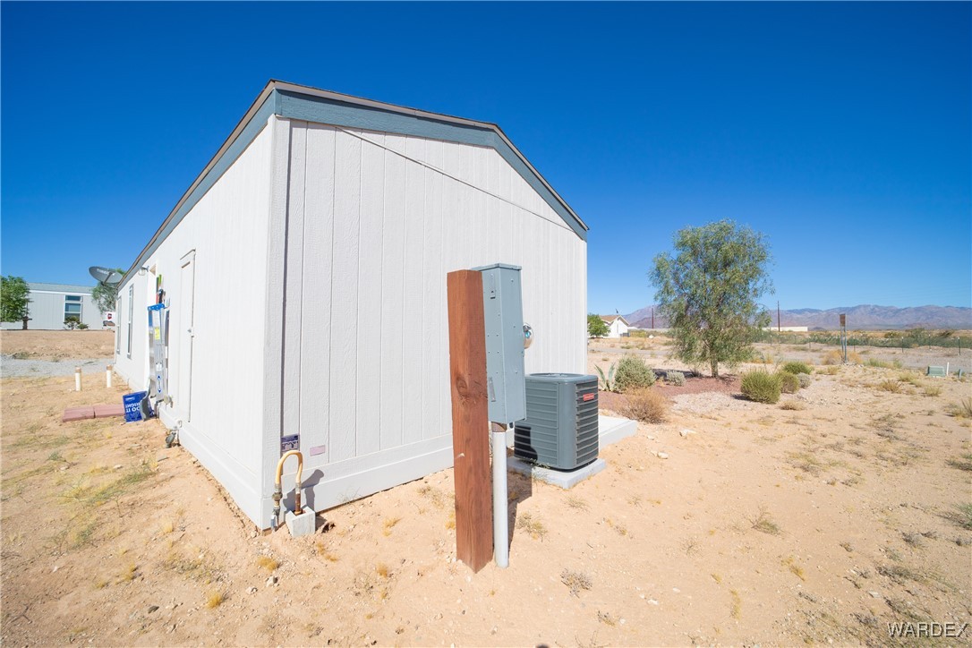 10747 South Paradise Trails Road Yucca, AZ 86438 - Photo 21 of 34 Side of Structure