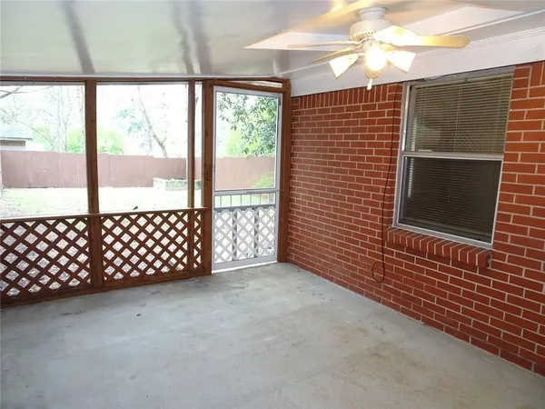 a spacious bathroom with a double vanity sink and mirror