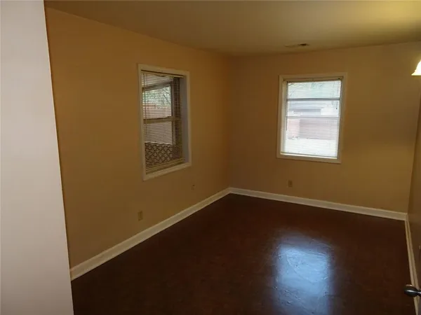 a backyard of a house with lots of green space