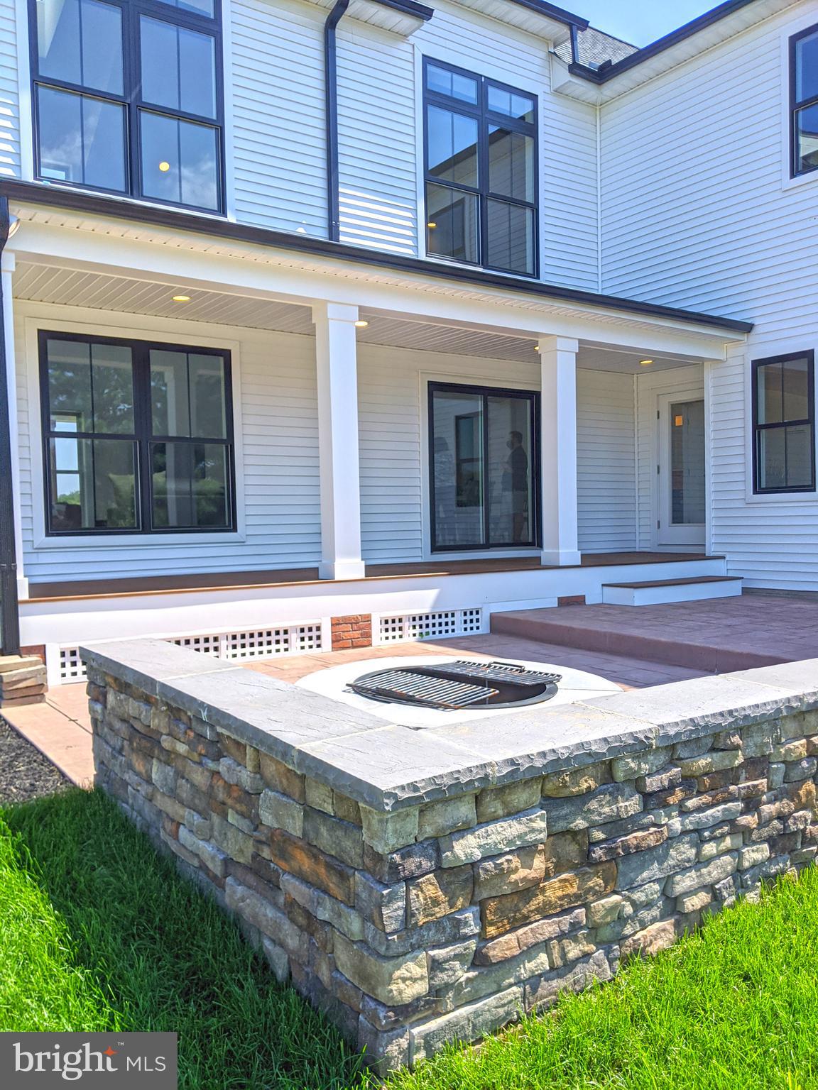 16448 Four Leaf Drive Lewes, DE 19958 - Photo 24 of 45 Rear Stamped Concrete Patio