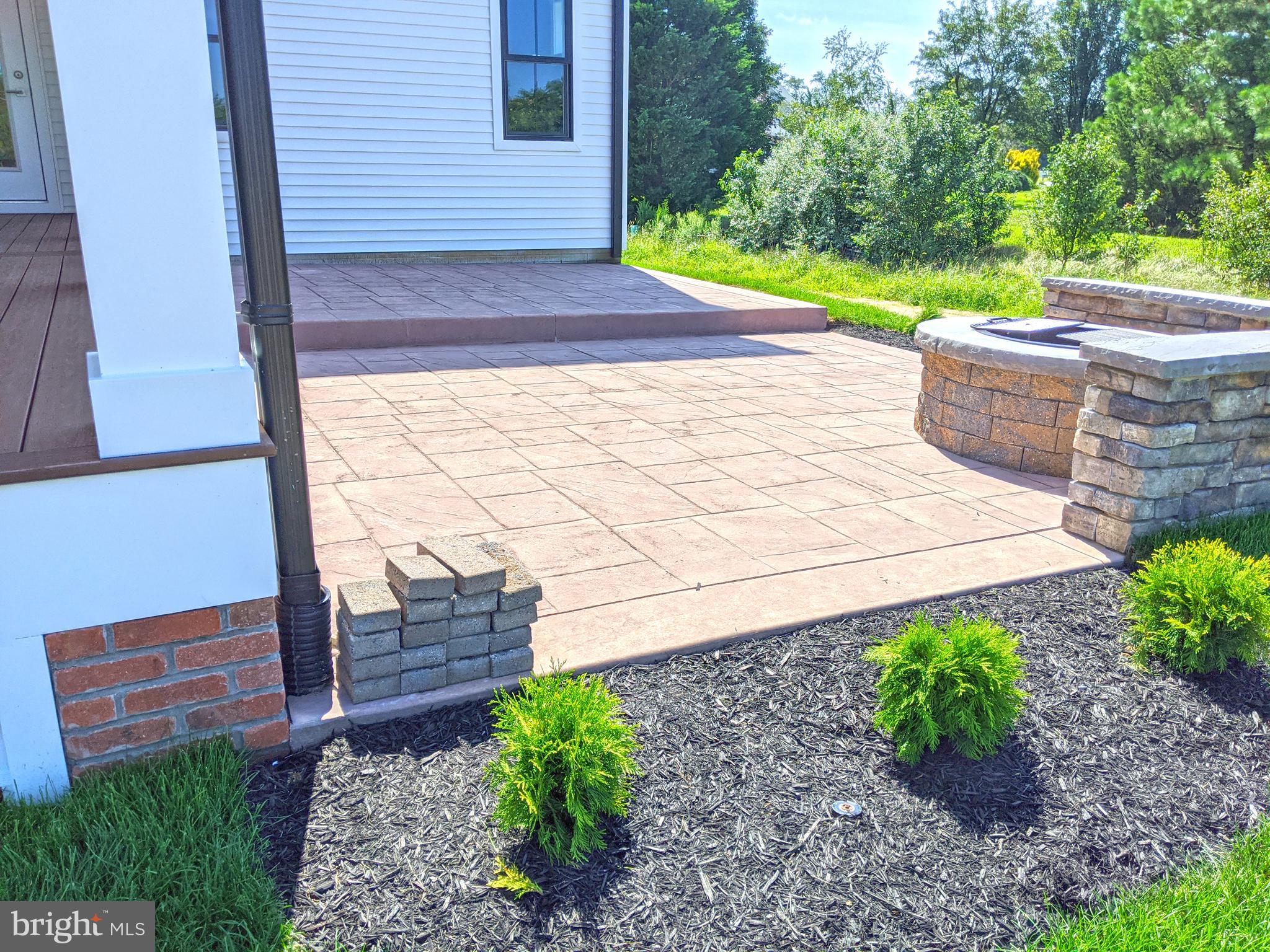 16448 Four Leaf Drive Lewes, DE 19958 - Photo 27 of 45 Rear Stamped Concrete Patio