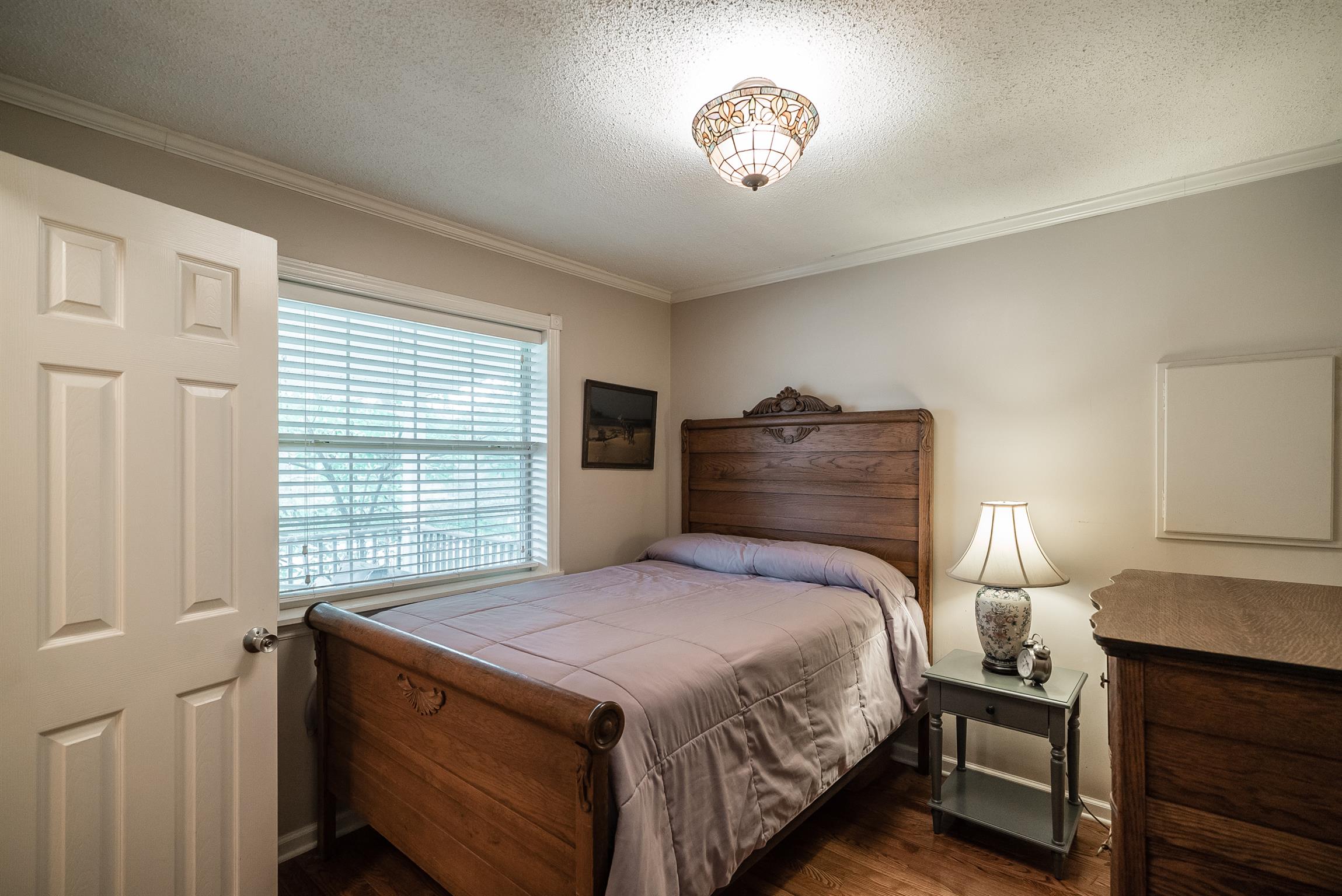 88 Canoe Branch Road Lebanon, TN 37087 - Photo 12 of 30 a bedroom with a bed and a night stand