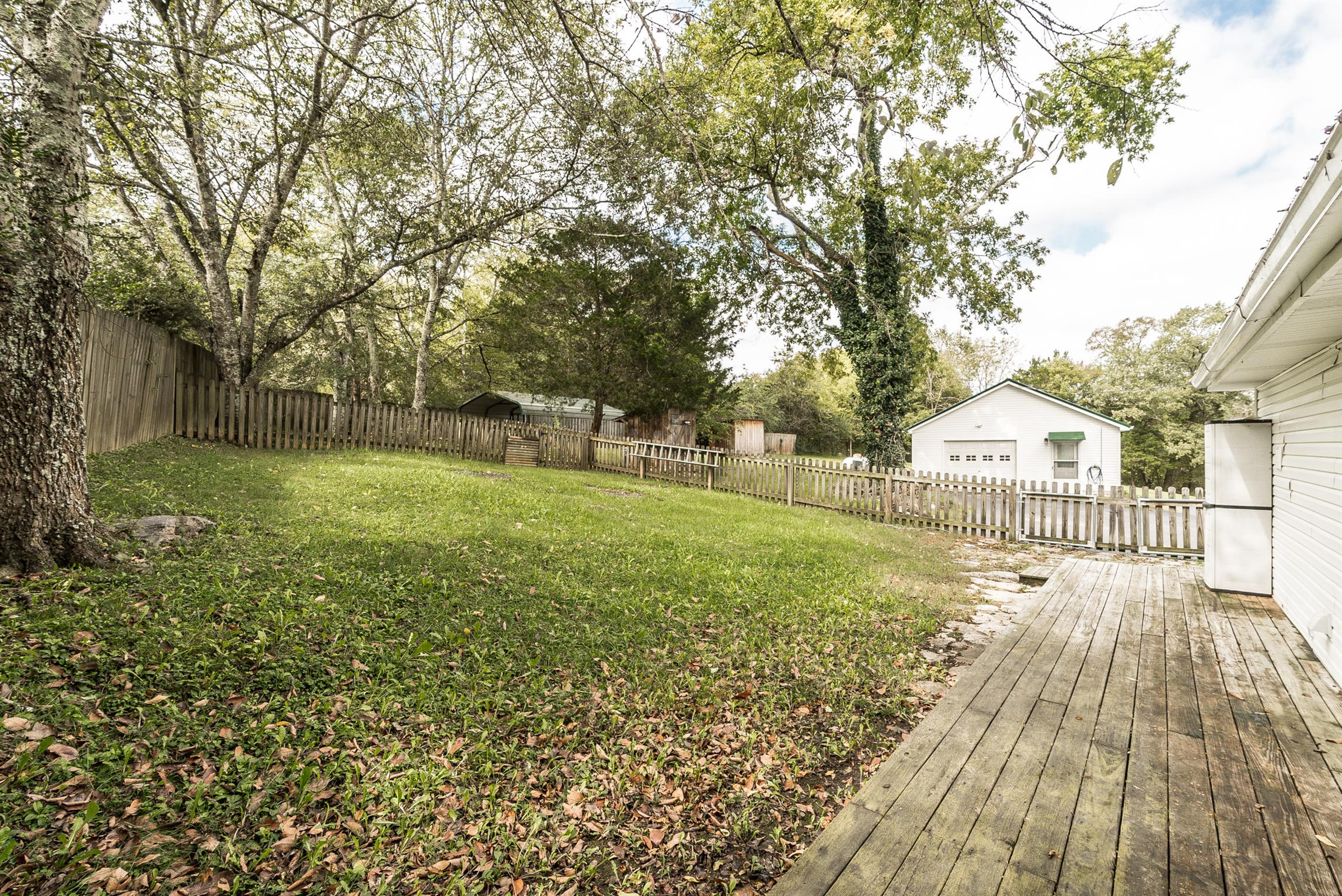 88 Canoe Branch Road Lebanon, TN 37087 - Photo 19 of 30 a view of a backyard with a garden