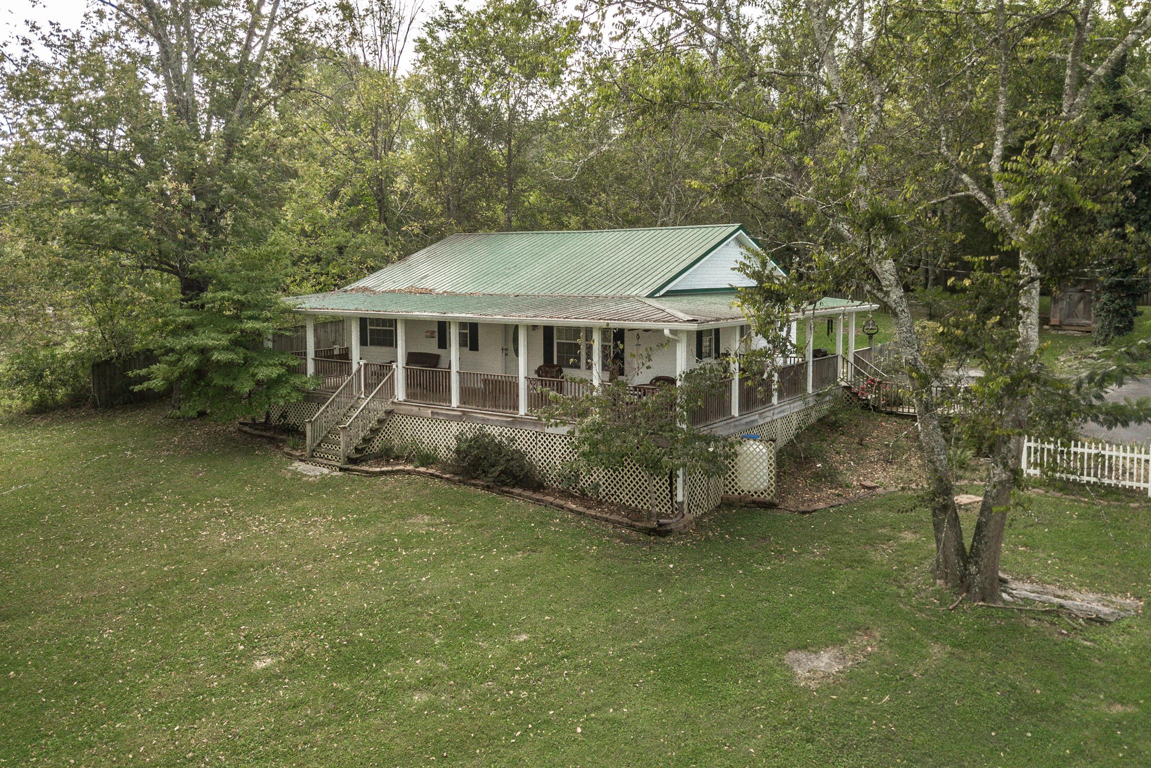88 Canoe Branch Road Lebanon, TN 37087 - Photo 2 of 30 an aerial view of a house with a garden