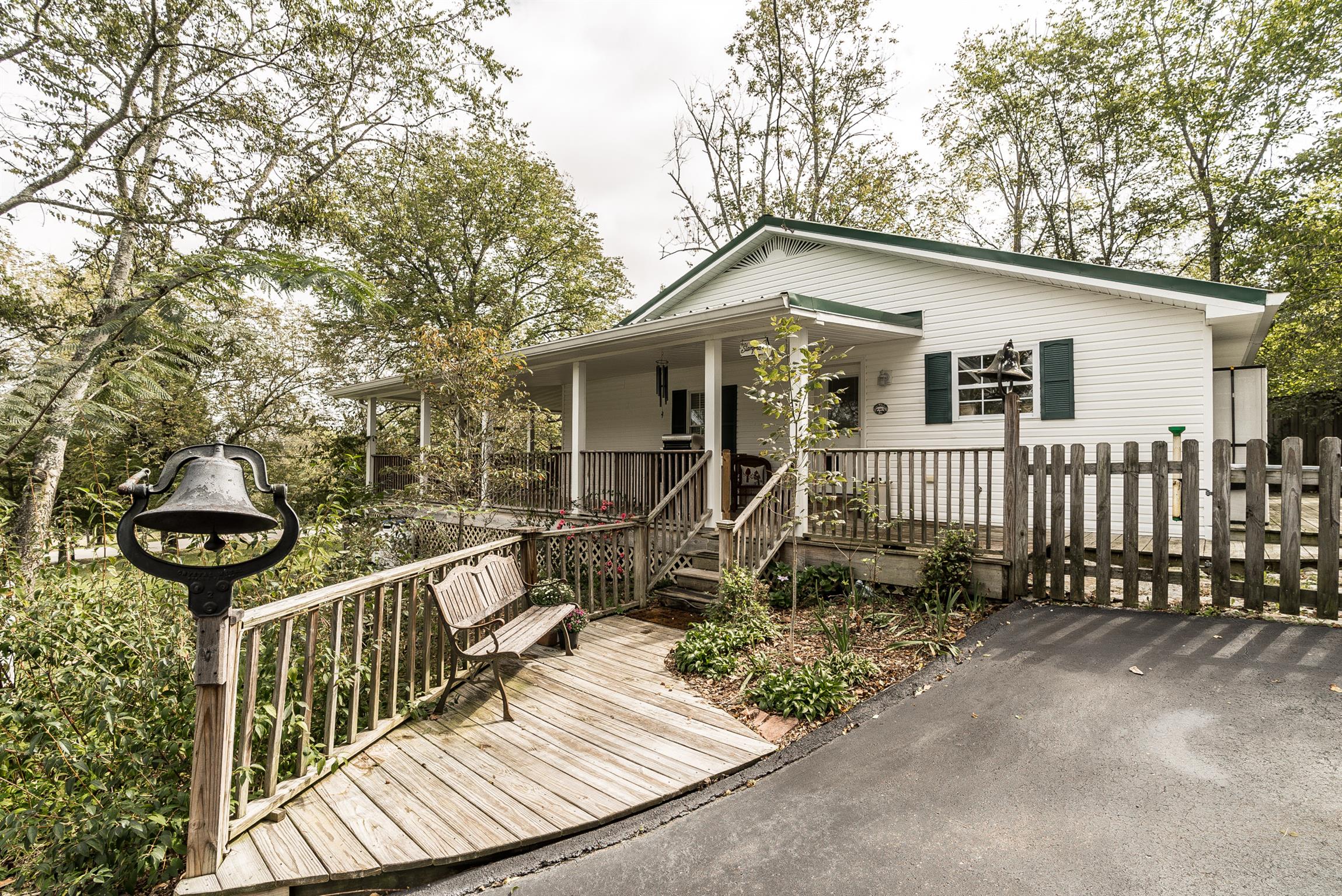 88 Canoe Branch Road Lebanon, TN 37087 - Photo 4 of 30 a view of a house with a yard and wooden fence