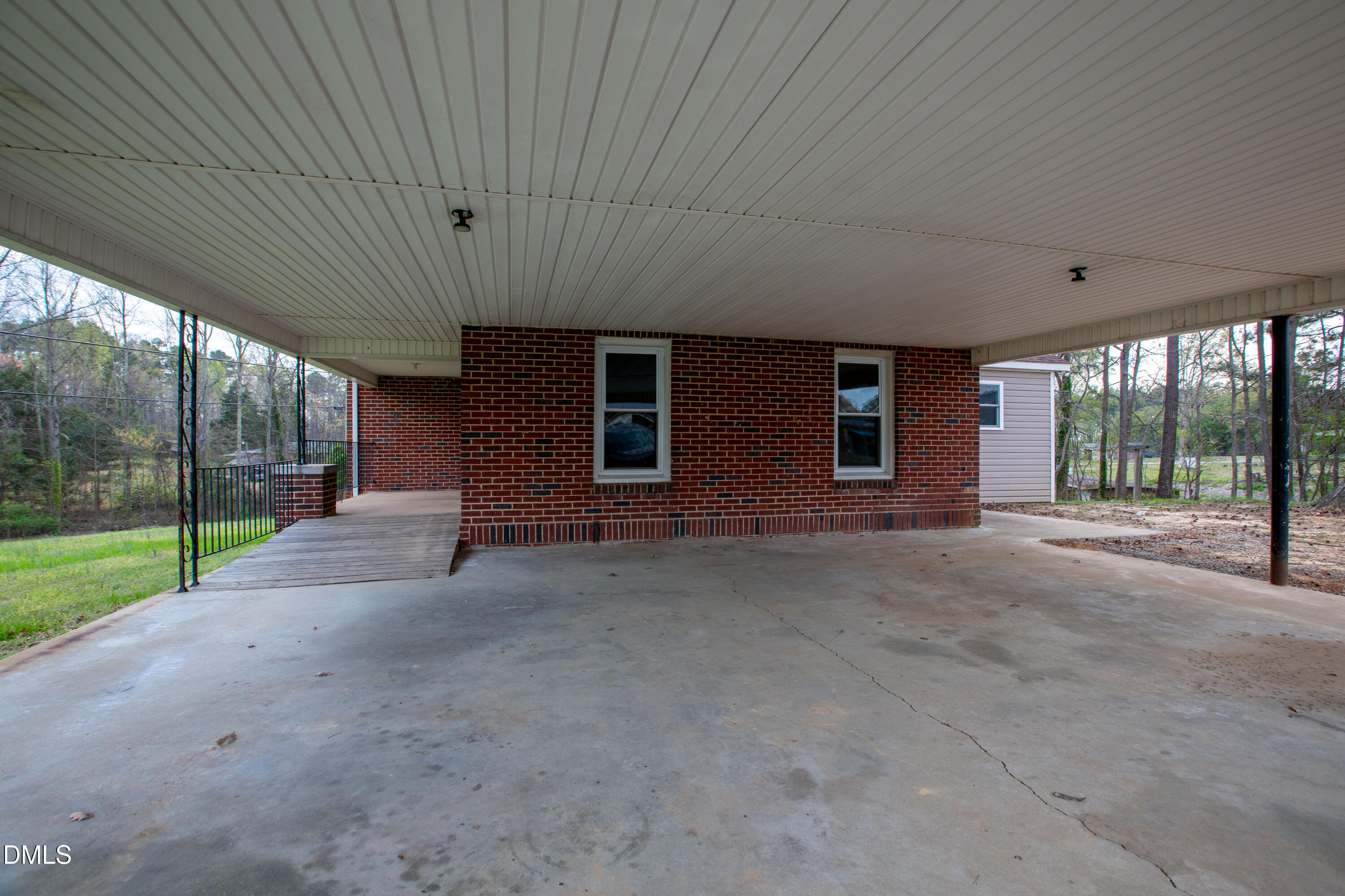 4295 Virgilina Road Roxboro, NC 27574 - Photo 29 of 46 a view of a house with backyard and porch