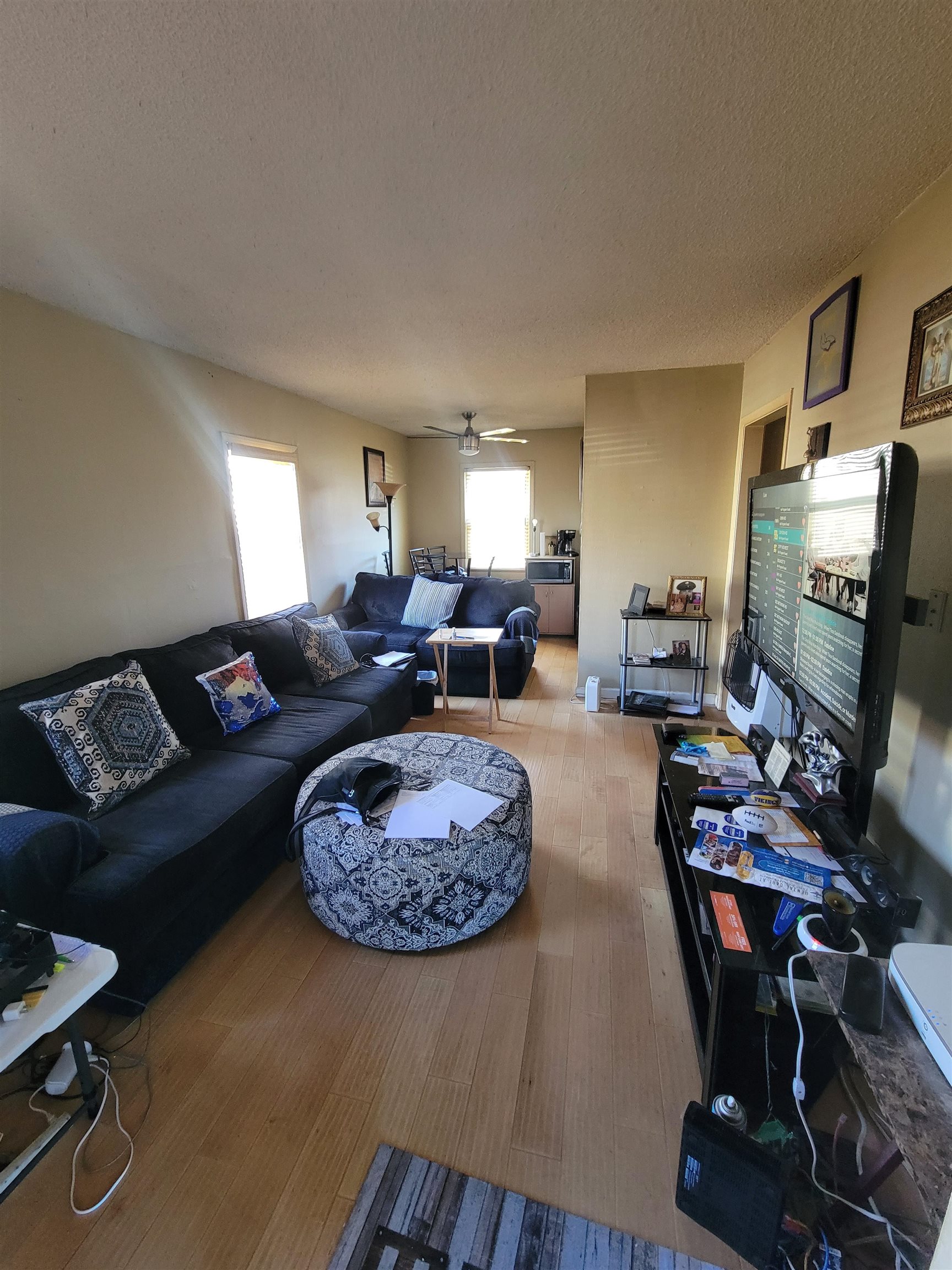 3166 Winslow Road Memphis, TN 38109 - Photo 2 of 12 a living room with furniture a rug a lamp and a window