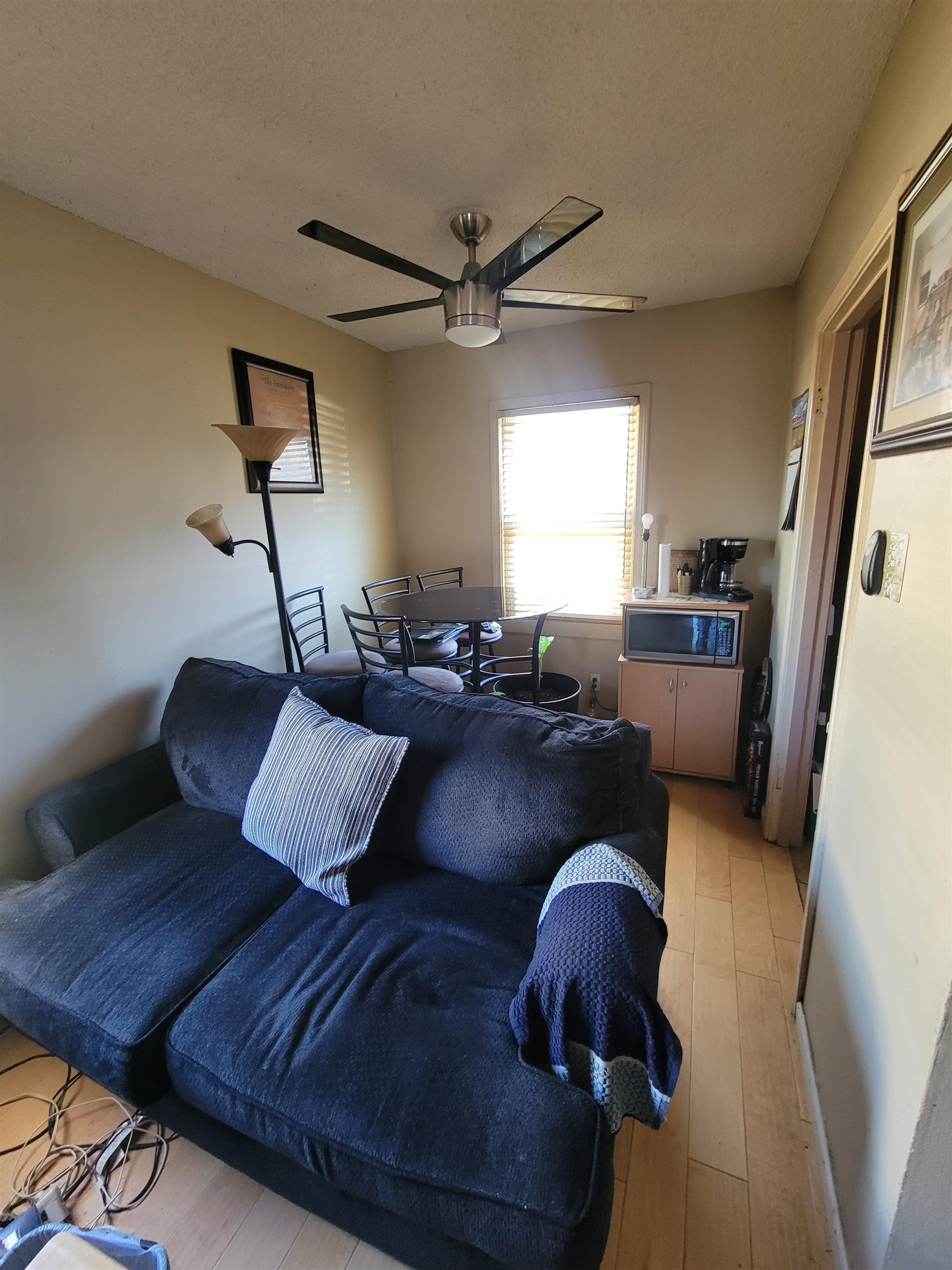 3166 Winslow Road Memphis, TN 38109 - Photo 3 of 12 a living room with furniture and a large window