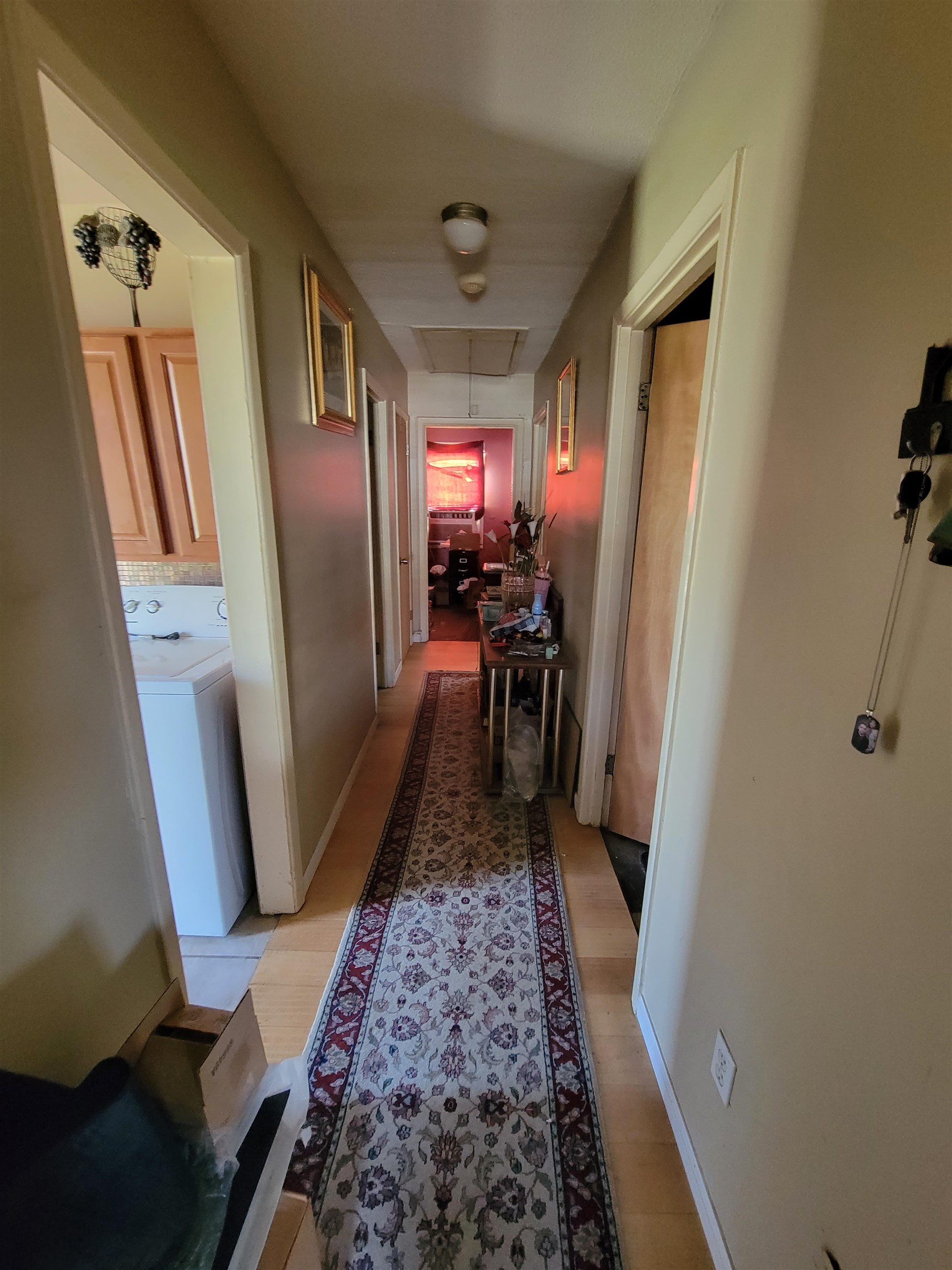 3166 Winslow Road Memphis, TN 38109 - Photo 7 of 12 a view of a hallway view with furniture and a window