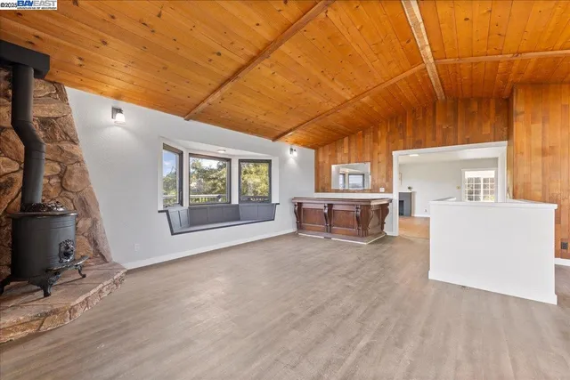a view of livingroom with hardwood and furniture