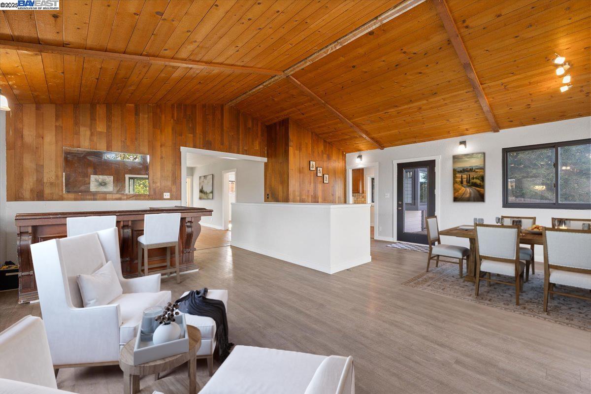3280 Ohlone Way Hayward, CA 94541 - Photo 18 of 48 a living room with furniture and a wooden floor