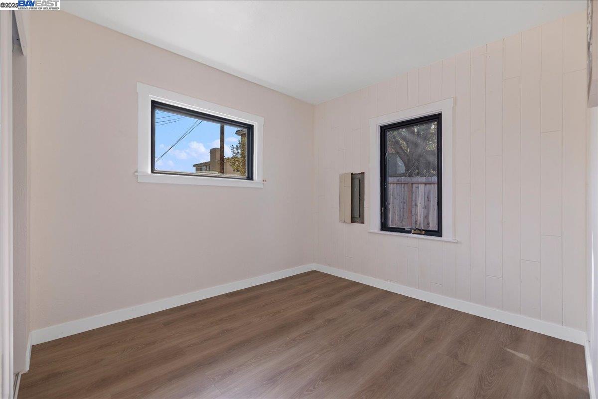 3280 Ohlone Way Hayward, CA 94541 - Photo 24 of 48 a view of an empty room with wooden floor and a window