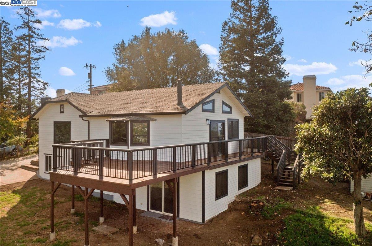 3280 Ohlone Way Hayward, CA 94541 - Photo 5 of 48 a view of a white house with a yard