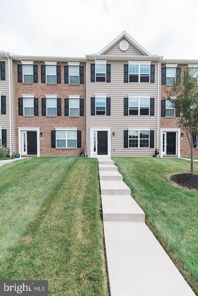 112 Breezewood Drive Hanover, PA 17331 - Photo 2 of 12 a view of residential houses with yard and seating area