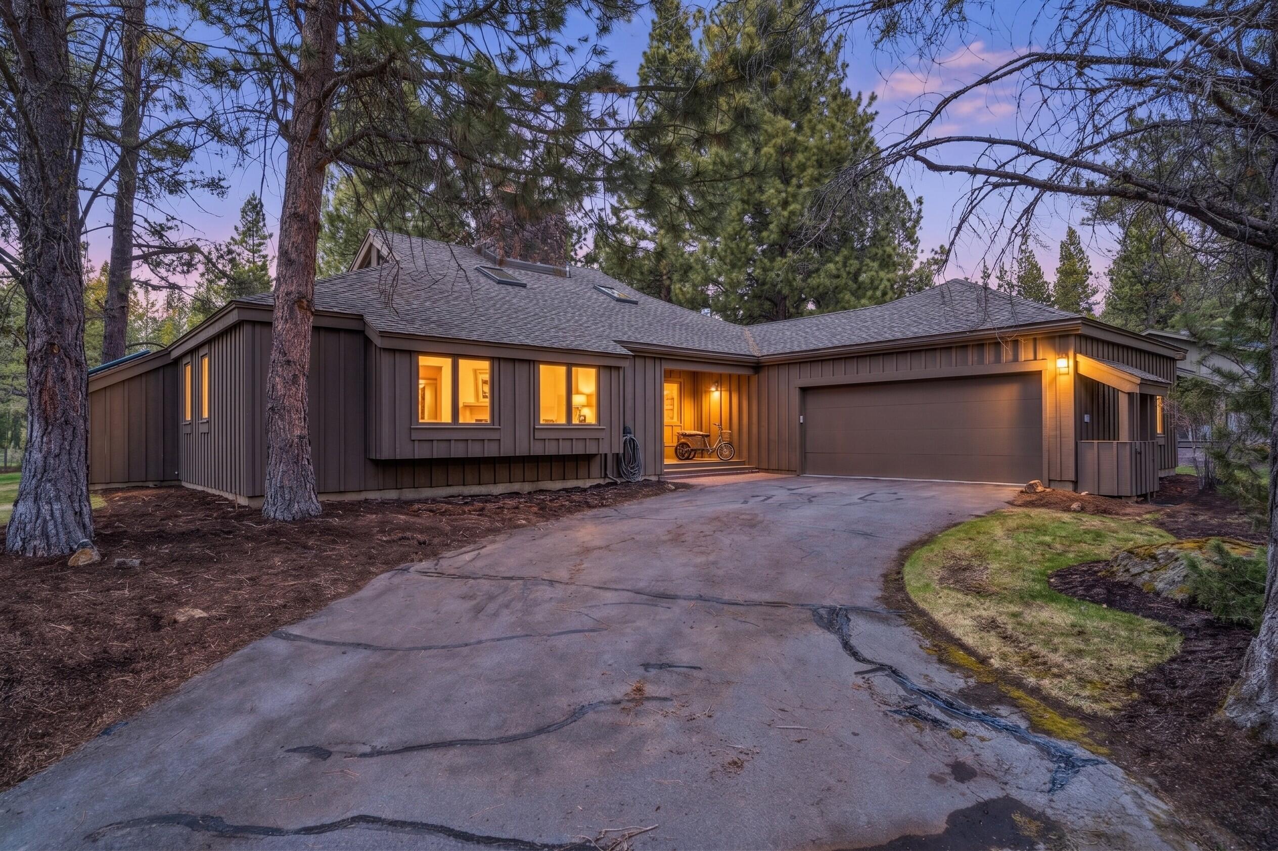 17866 Grouse Lane, Unit 3 Sunriver, OR 97707 - Photo 5 of 61 a view of a house with a yard