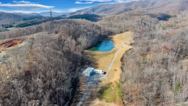 a view of a lake with a big yard
