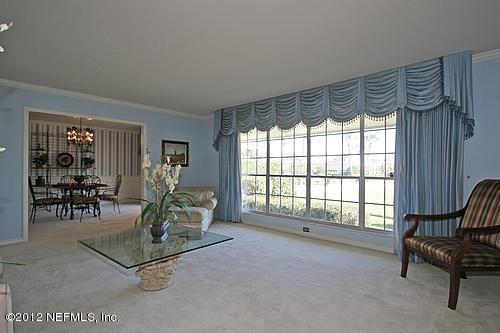 322 Pablo Road Ponte Vedra Beach, FL 32082 - Photo 5 of 19 a living room with furniture and a window