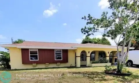 a view of a yard in front of a house