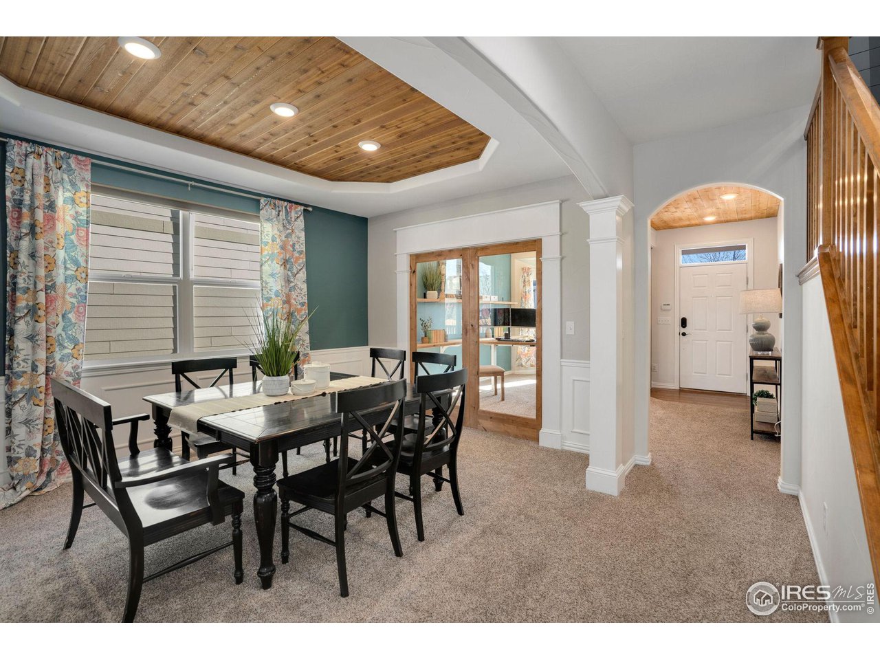 1540 Millfleet Drive Windsor, CO 80550 - Photo 7 of 40 a view of a dining room with furniture and window