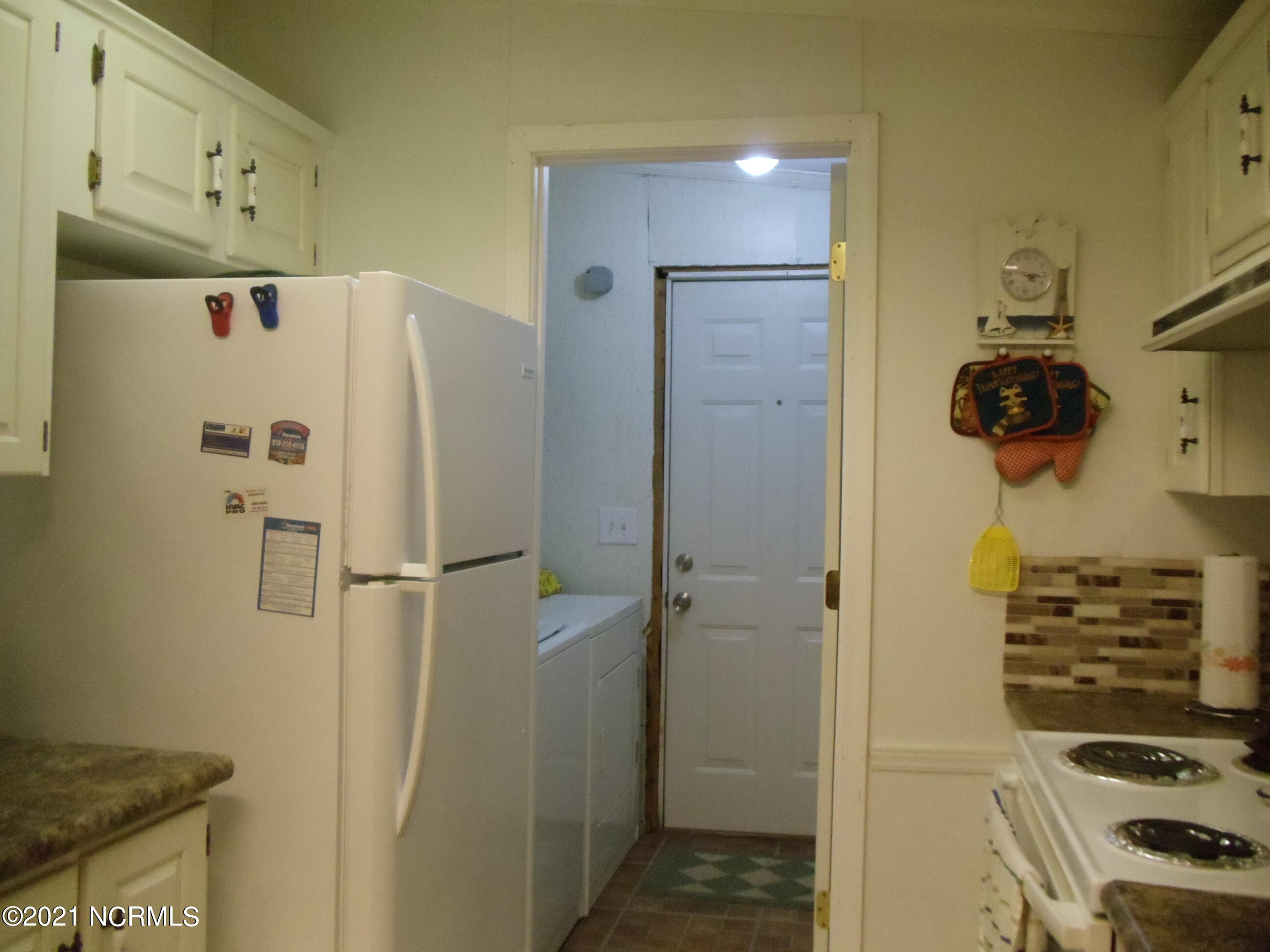 562 Riggs Road Hubert, NC 28539 - Photo 10 of 14 Kitchen to Laundry Room