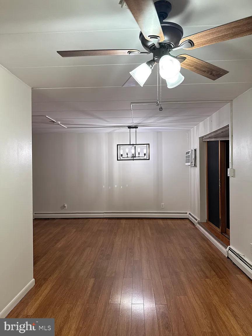 1575 West Street Road, Unit 812 Warminster, PA 18974 - Photo 6 of 17 a view of an empty room with wooden floor