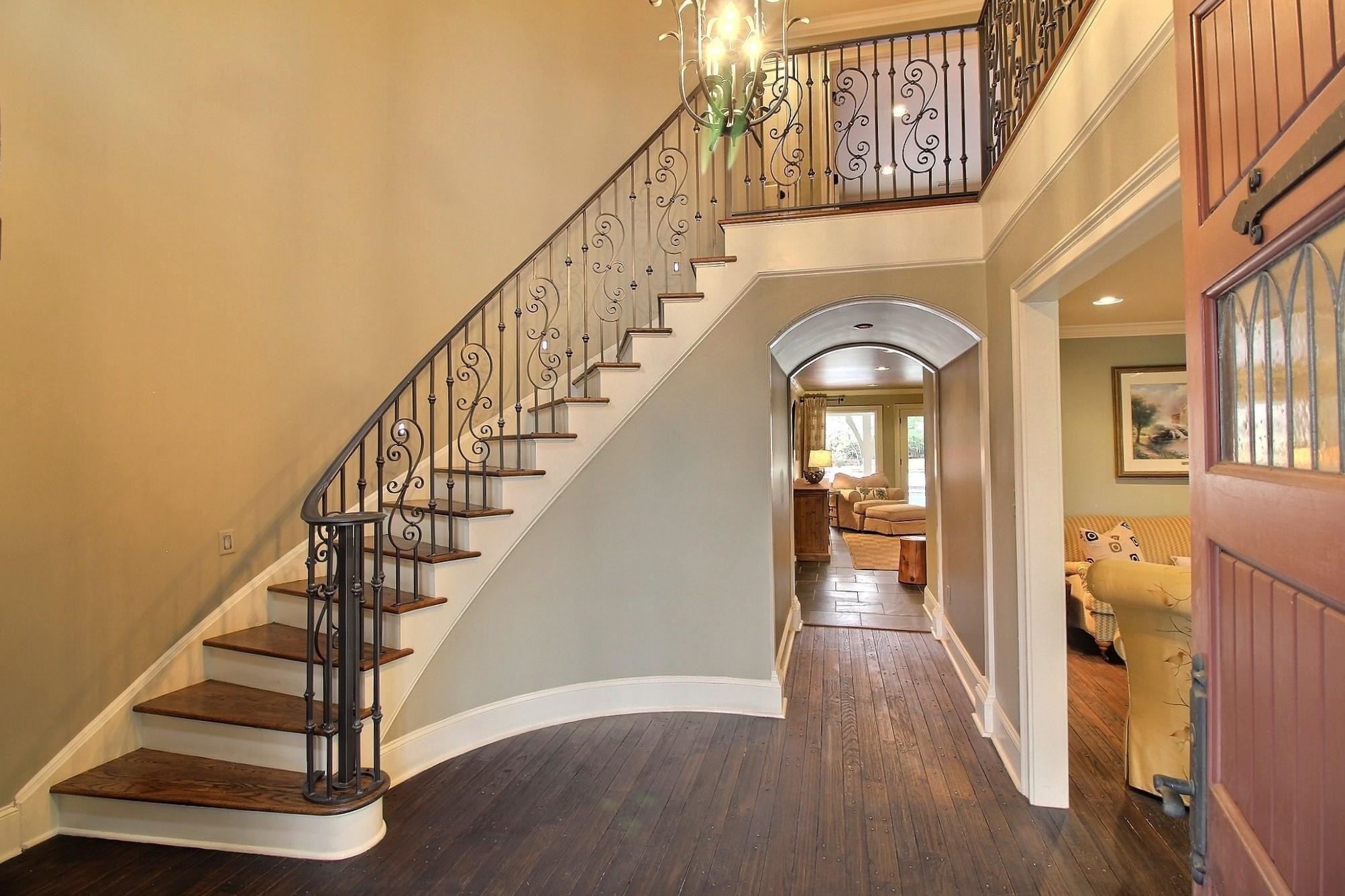 596 Bray Station Road Collierville, TN 38017 - Photo 8 of 36 Gracious hardwood entry with winding staircase.