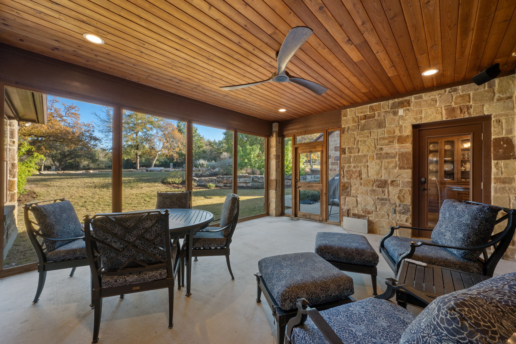 204 Overlook Court Georgetown, TX 78628 - Photo 29 of 33 Screened in porch with recessed lights, speakers, and ceiling fan