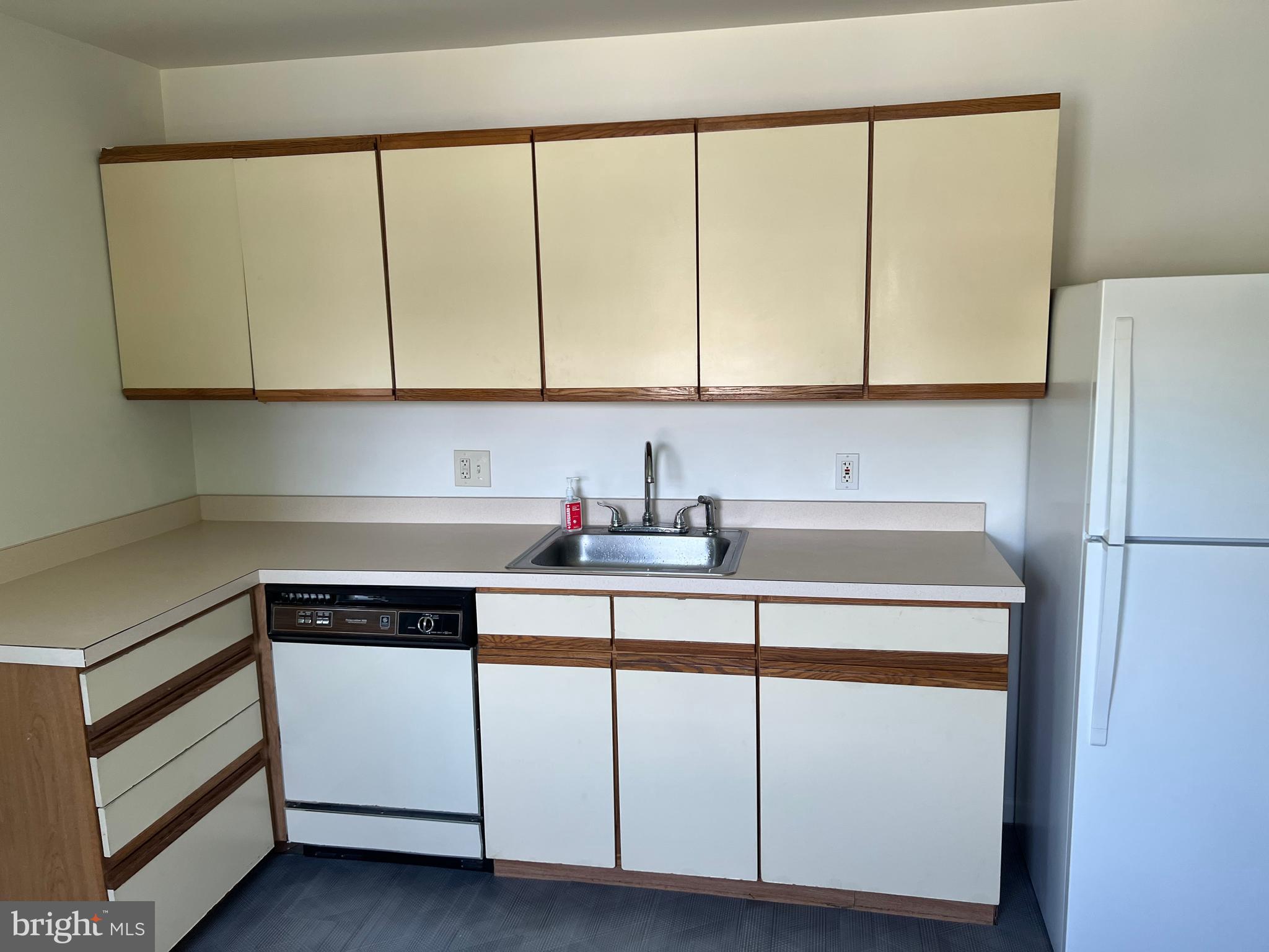 1636 Otts Chapel Road Newark, DE 19702 - Photo 21 of 24 a kitchen with a white cabinets and white appliances