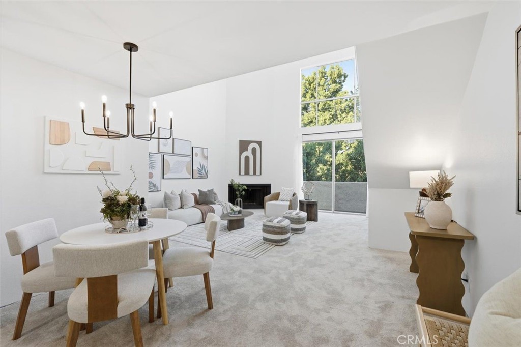 11645 Montana Avenue, Unit 321 Los Angeles, CA 90049 - Photo 1 of 41 a view of a dining room with furniture window and outside view