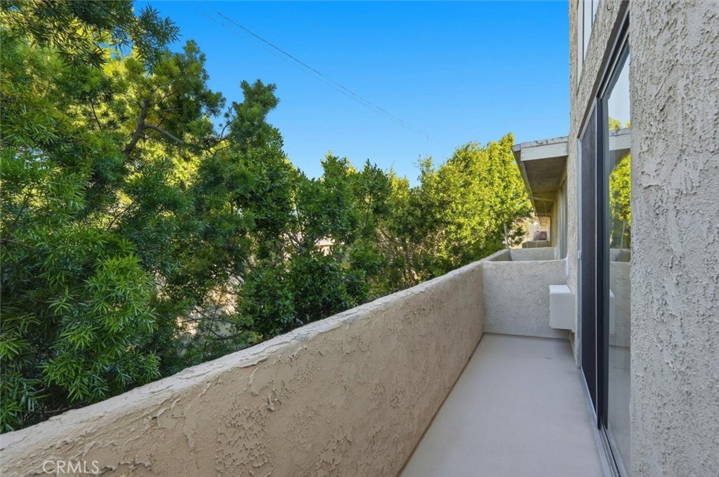 11645 Montana Avenue, Unit 321 Los Angeles, CA 90049 - Photo 3 of 41 a view of a balcony with an outdoor space