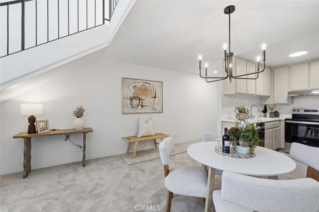 11645 Montana Avenue, Unit 321 Los Angeles, CA 90049 - Photo 5 of 41 a view of a dining room with furniture