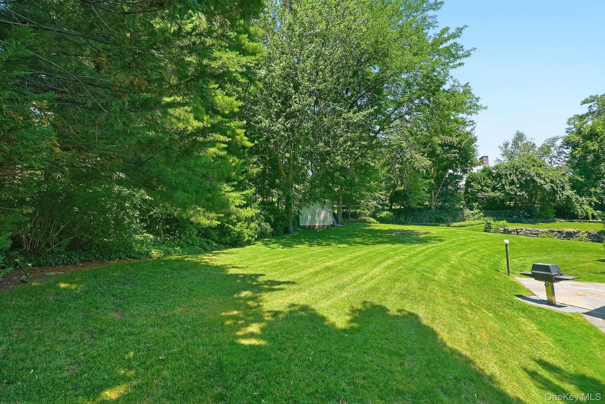 1 Sheridan Road Scarsdale, NY 10583 - Photo 34 of 40 Long view across the backyard of this .45 acre haven