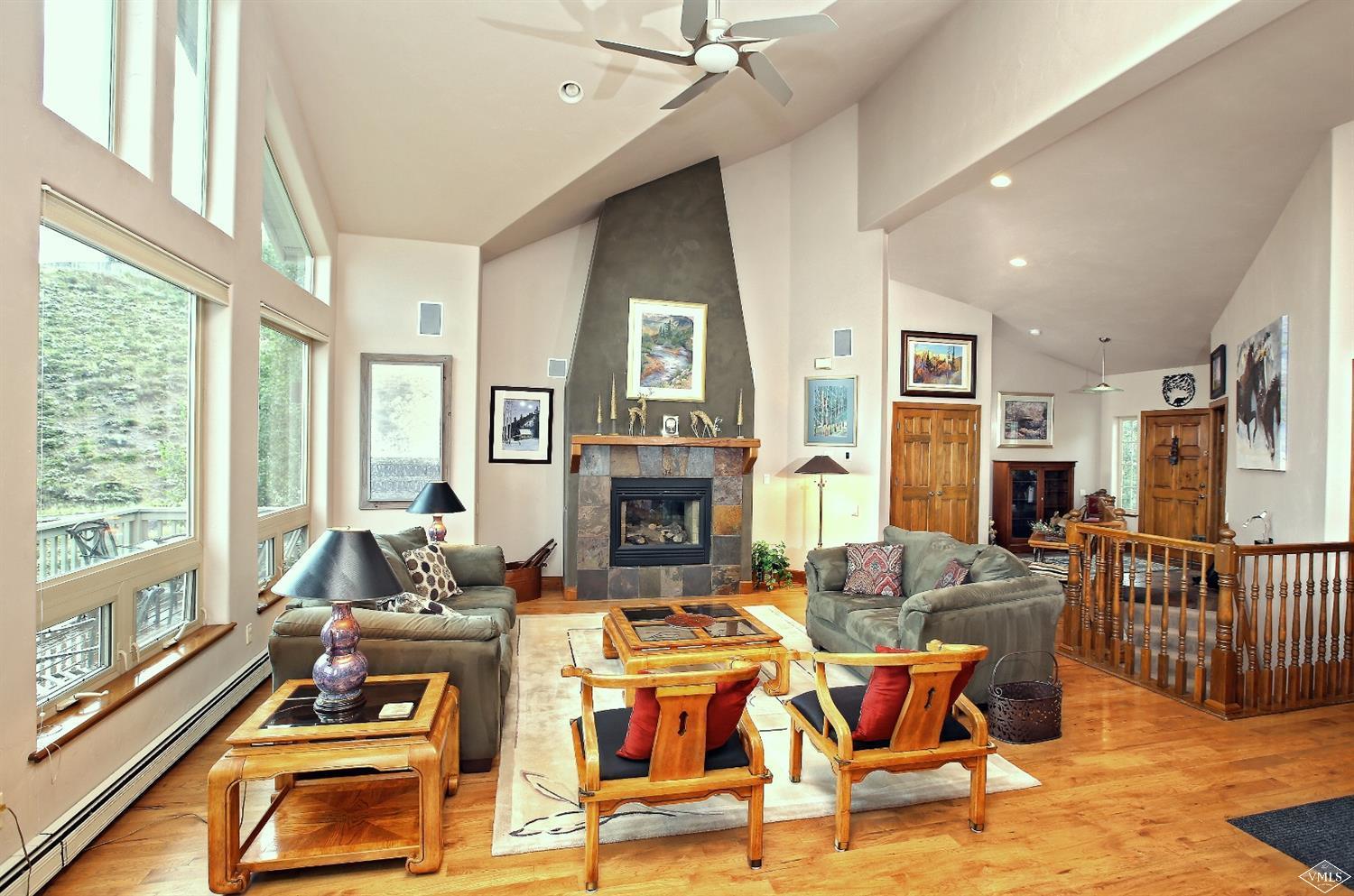 5015 Wildridge Road East, Unit A Avon, CO 81620 - Photo 8 of 22 a living room with furniture fireplace and flat screen tv
