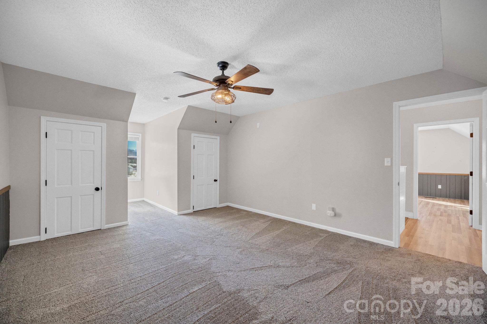 2581 Double Island Road Green Mountain, NC 28740 - Photo 21 of 48 a view of an empty room