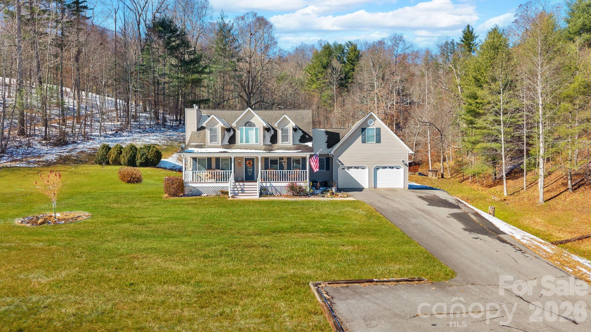 2581 Double Island Road Green Mountain, NC 28740 - Photo 43 of 48 a front view of a house with swimming pool having outdoor seating